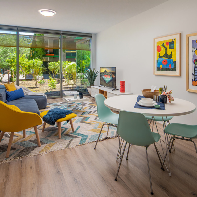 Optima Sonoran Village - Living Room with Cozy Couch and Dining Area